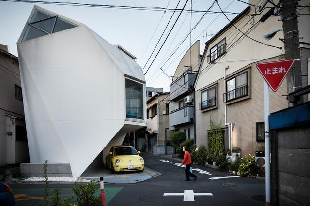 日本人为了解决人多地少的问题,于是就修建了这样的房子